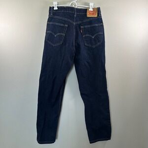 Levis 550 Relaxed Tappered Leg Jeans Mens 33x32 (measures 31 x 31.5)  Dark Wash